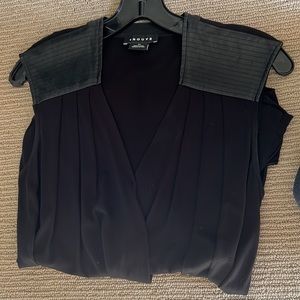 Black top with faux leather shoulder detail